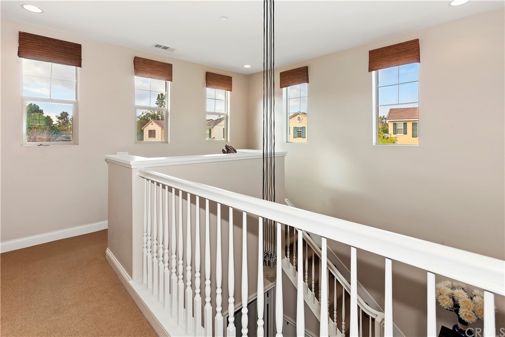 95 Shadowbrook Irvine, CA 92604 - Photo 6 of 23 a view of hallway with windows