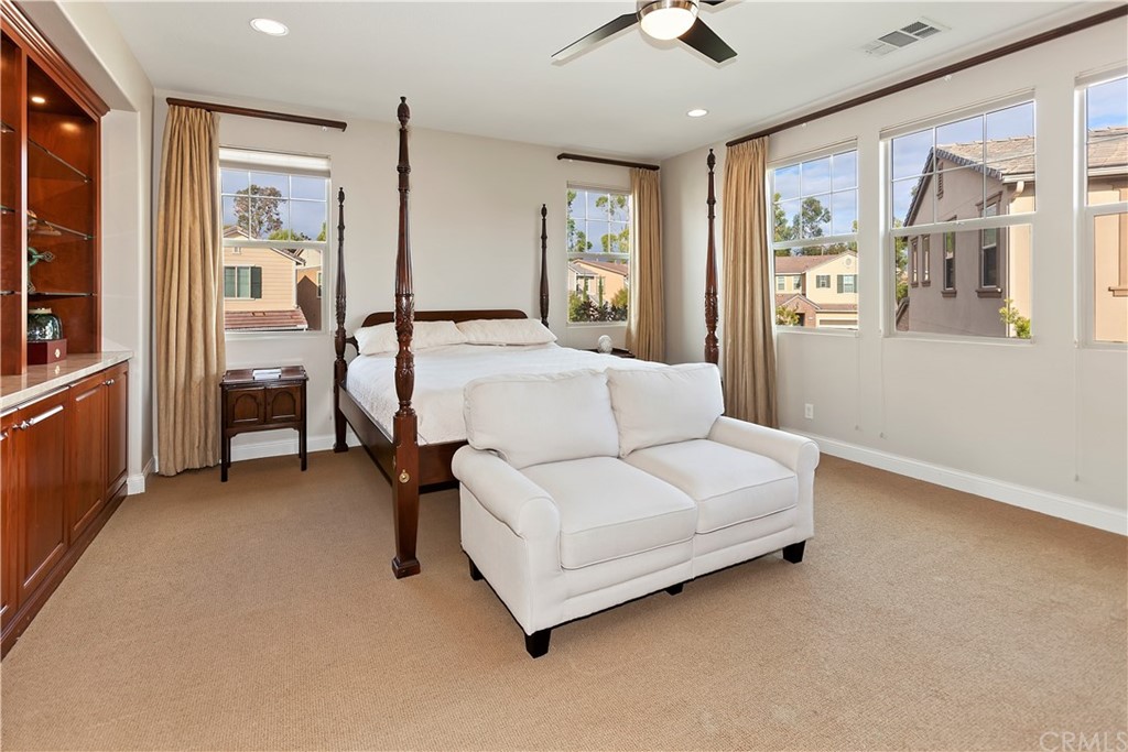 95 Shadowbrook Irvine, CA 92604 - Photo 7 of 23 a living room with furniture and a window