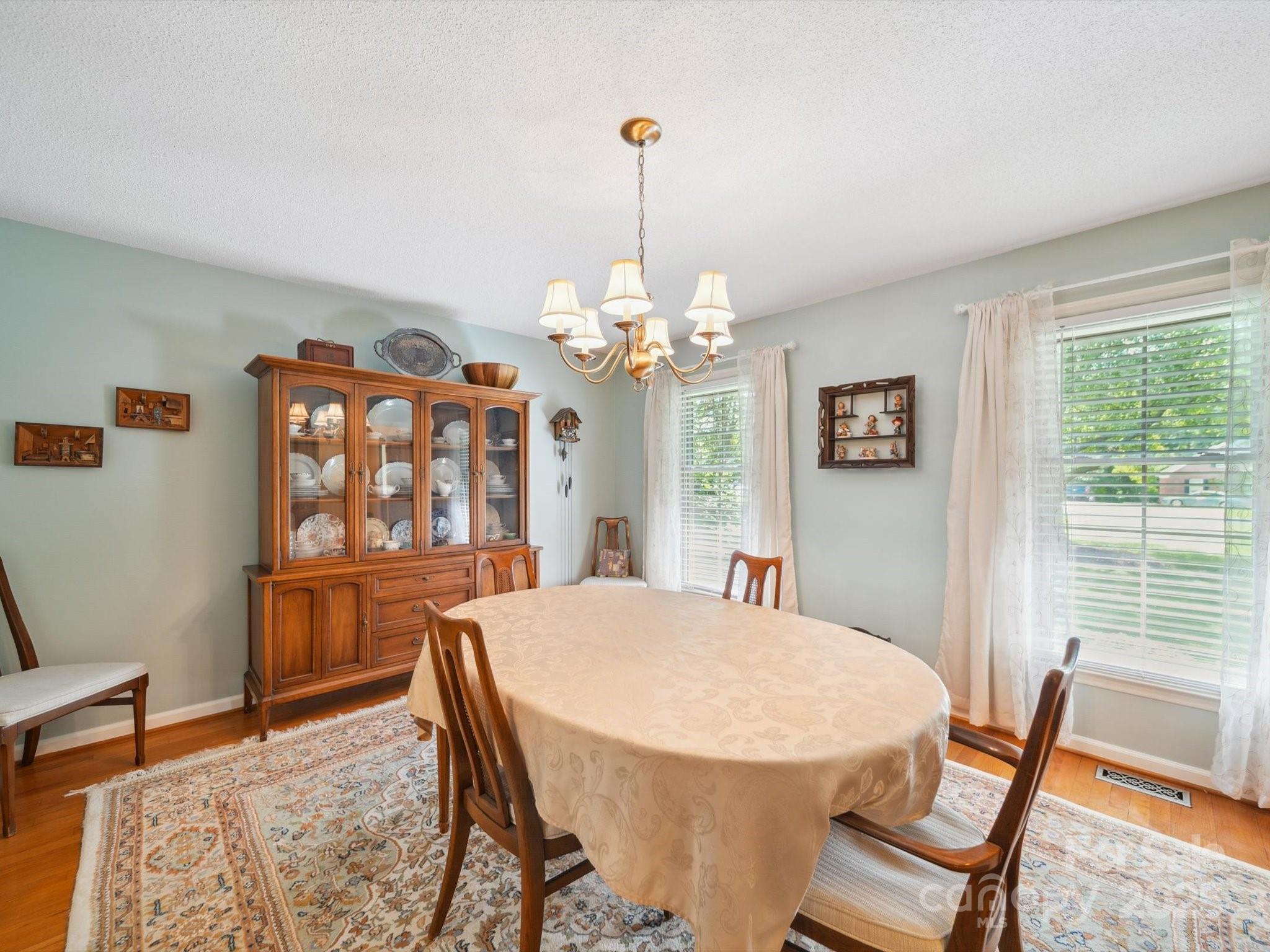 394 Gold Mine Road Wadesboro, NC 28170 - Photo 14 of 39 a dining room with furniture and window