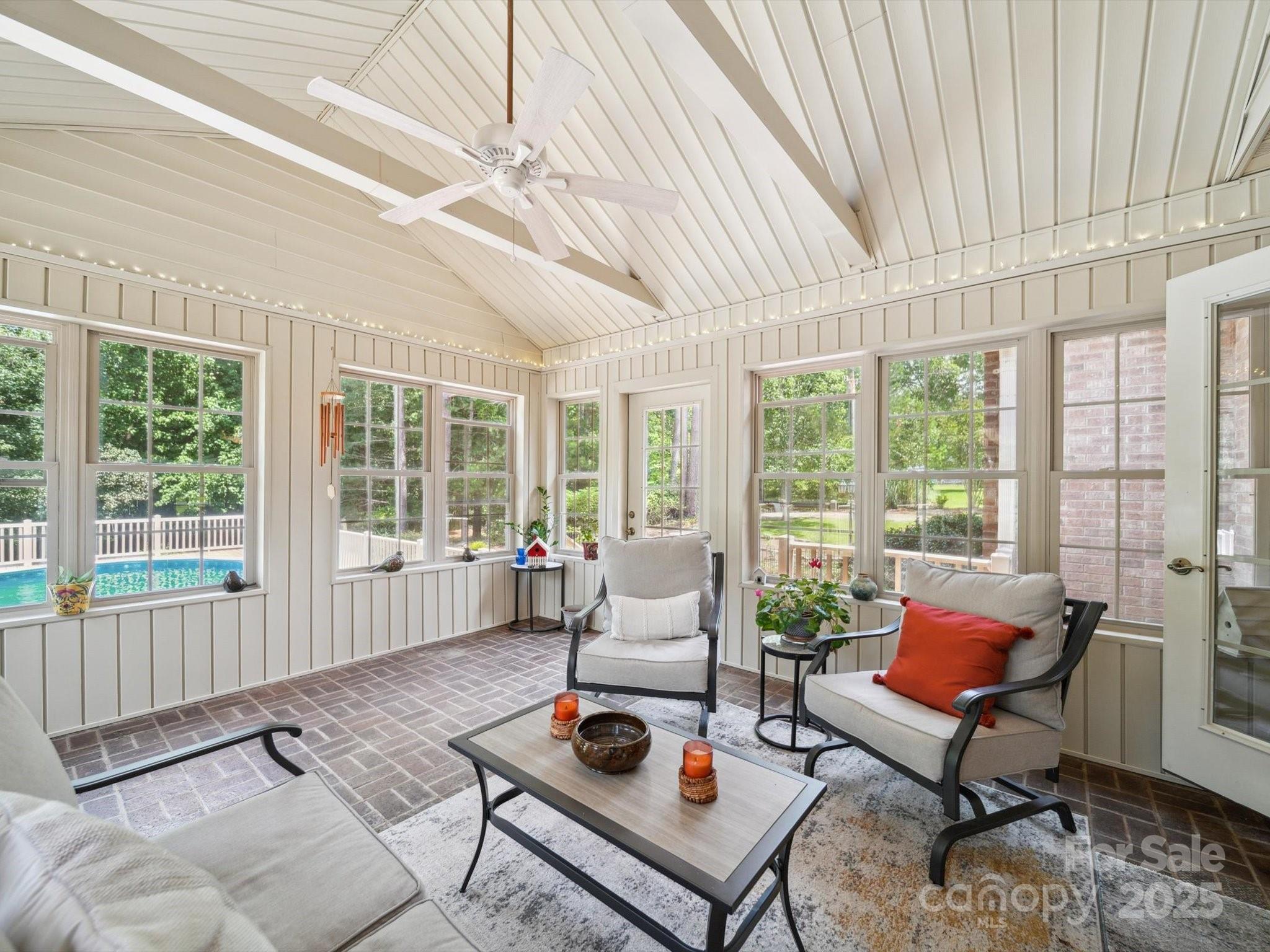 394 Gold Mine Road Wadesboro, NC 28170 - Photo 17 of 39 a living room with furniture and large windows