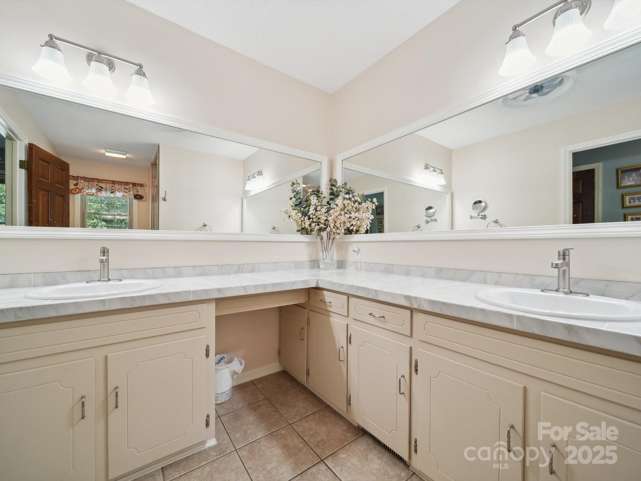 394 Gold Mine Road Wadesboro, NC 28170 - Photo 20 of 39 a bathroom with a sink and a mirror