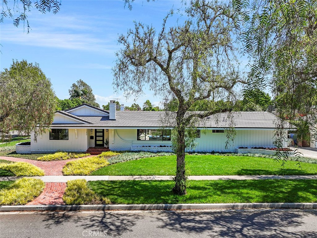 1380 Bryant Road Long Beach, CA 90815 - Photo 1 of 1 a front view of house with yard and green space