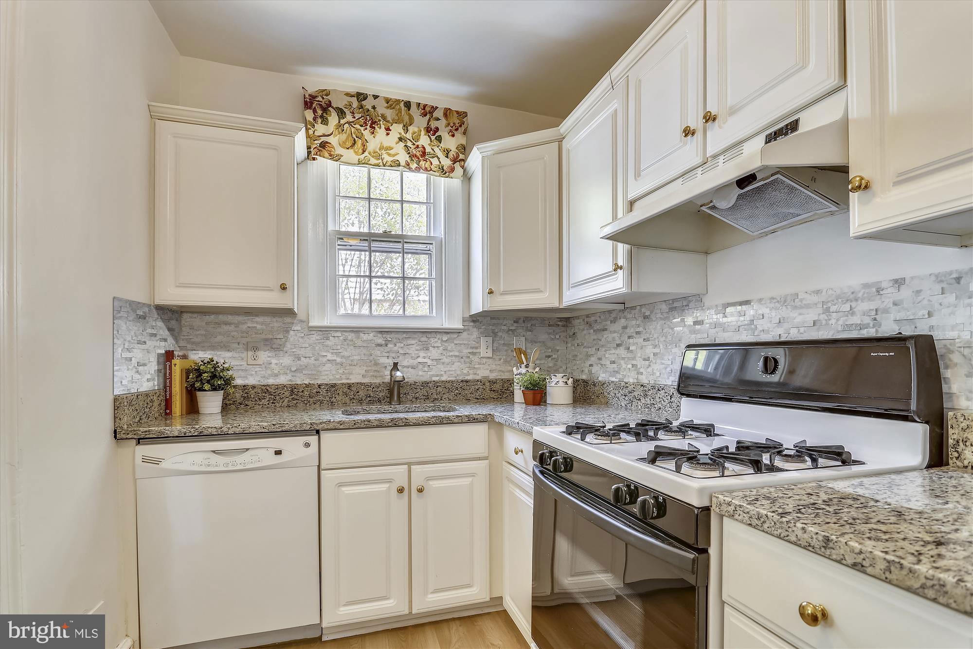 2705 Russell Road Alexandria, VA 22305 - Photo 9 of 45 Bright and light kitchen