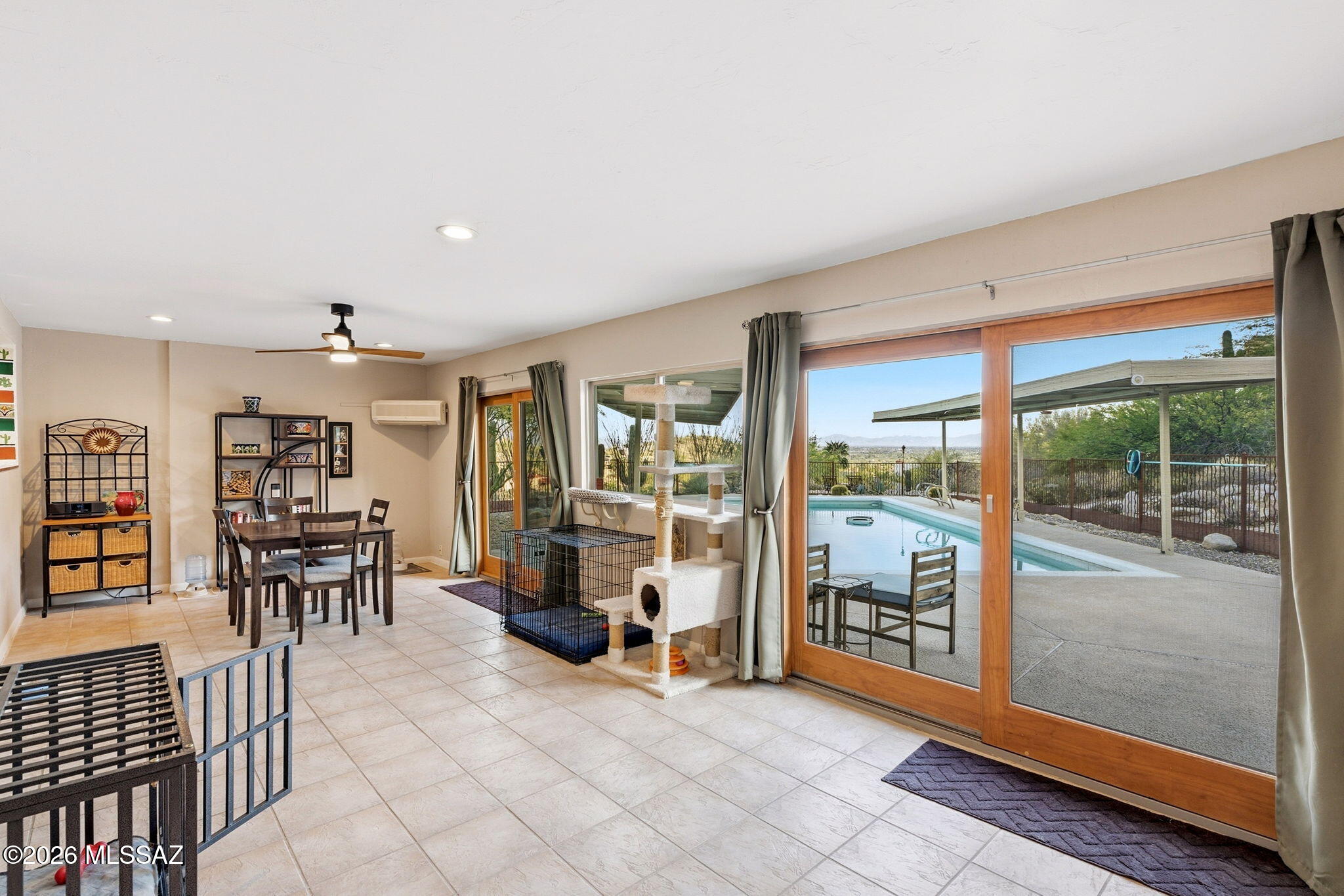 4641 North Rockcliff Road Tucson, AZ 85750 - Photo 22 of 48 Enclosed Arizona Room, cooled and heated.