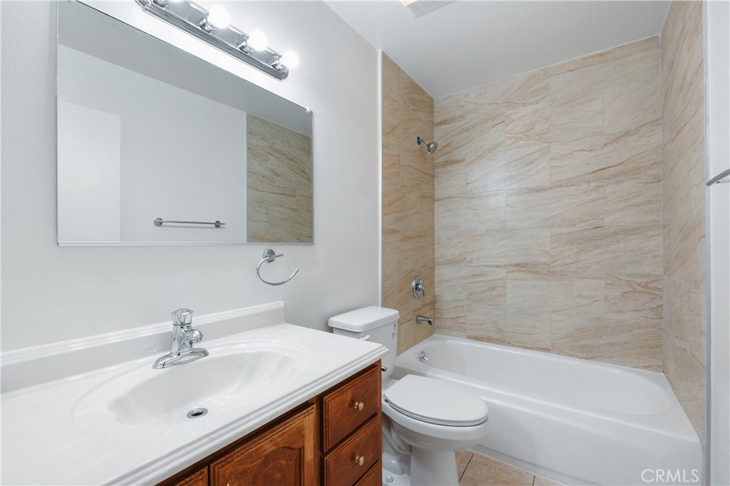 2172 Belhaven Avenue Simi Valley, CA 93063 - Photo 12 of 24 a bathroom with a sink a toilet and shower