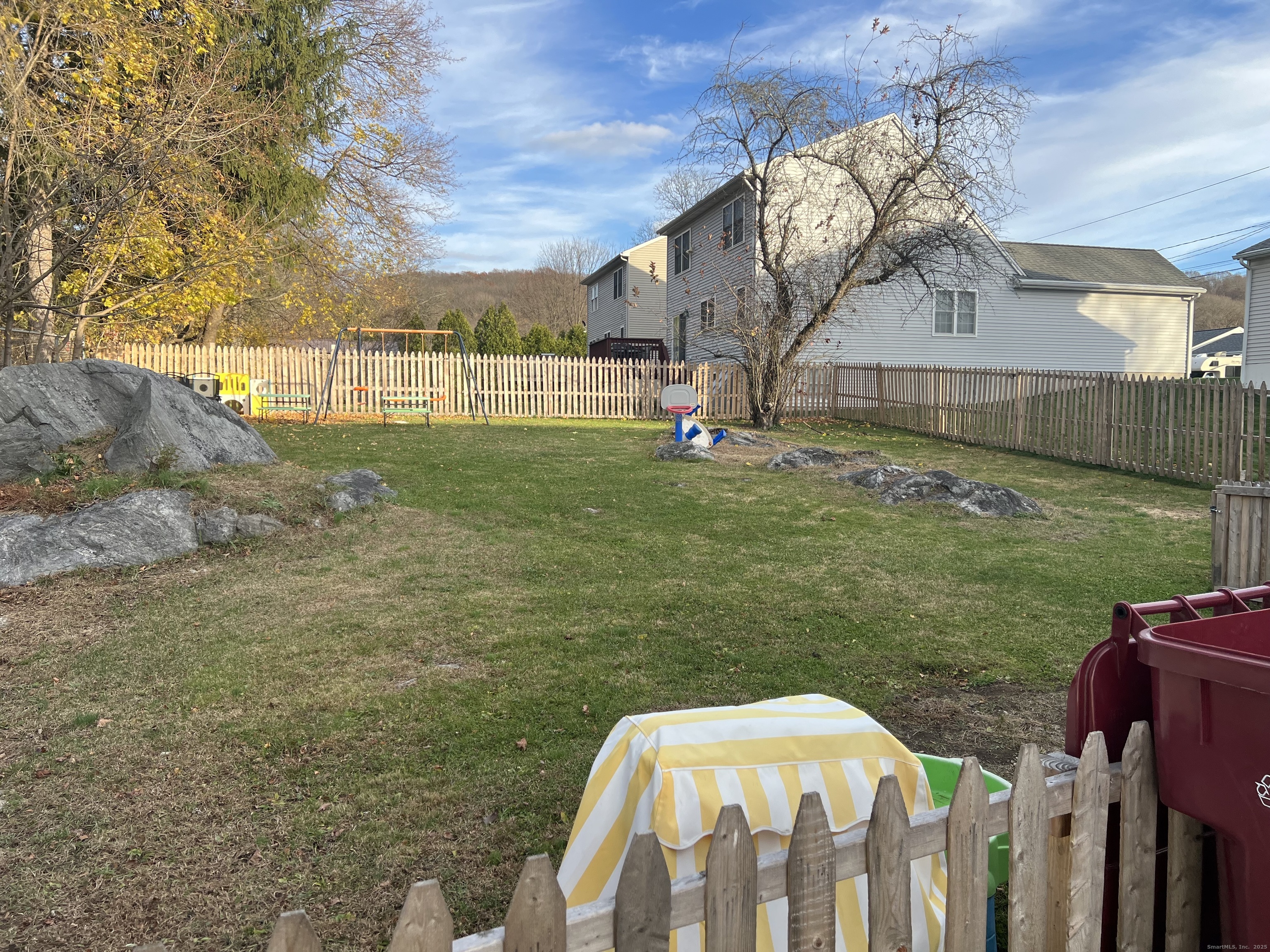 181 High Street, Unit 2 Naugatuck, CT 06770 - Photo 14 of 14 a view of yard with swimming pool and seating
