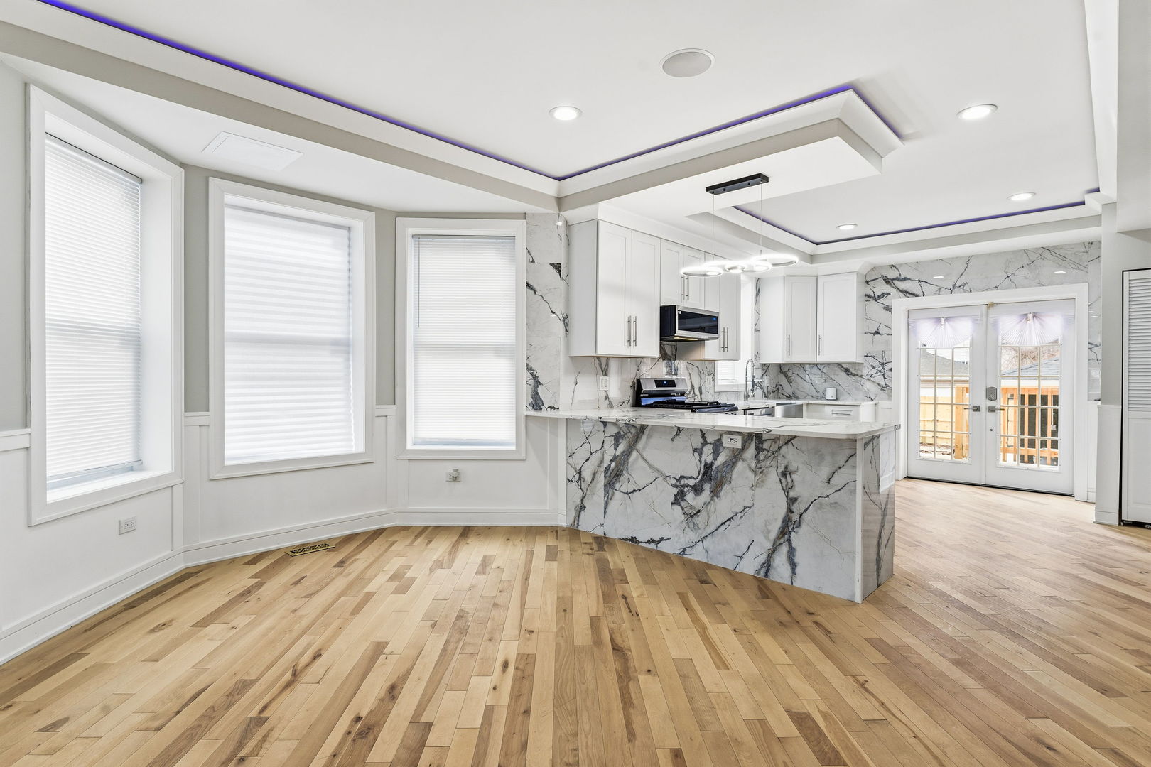 9410 South Champlain Avenue Chicago, IL 60619 - Photo 5 of 35 a view of kitchen with cabinets and wooden floor