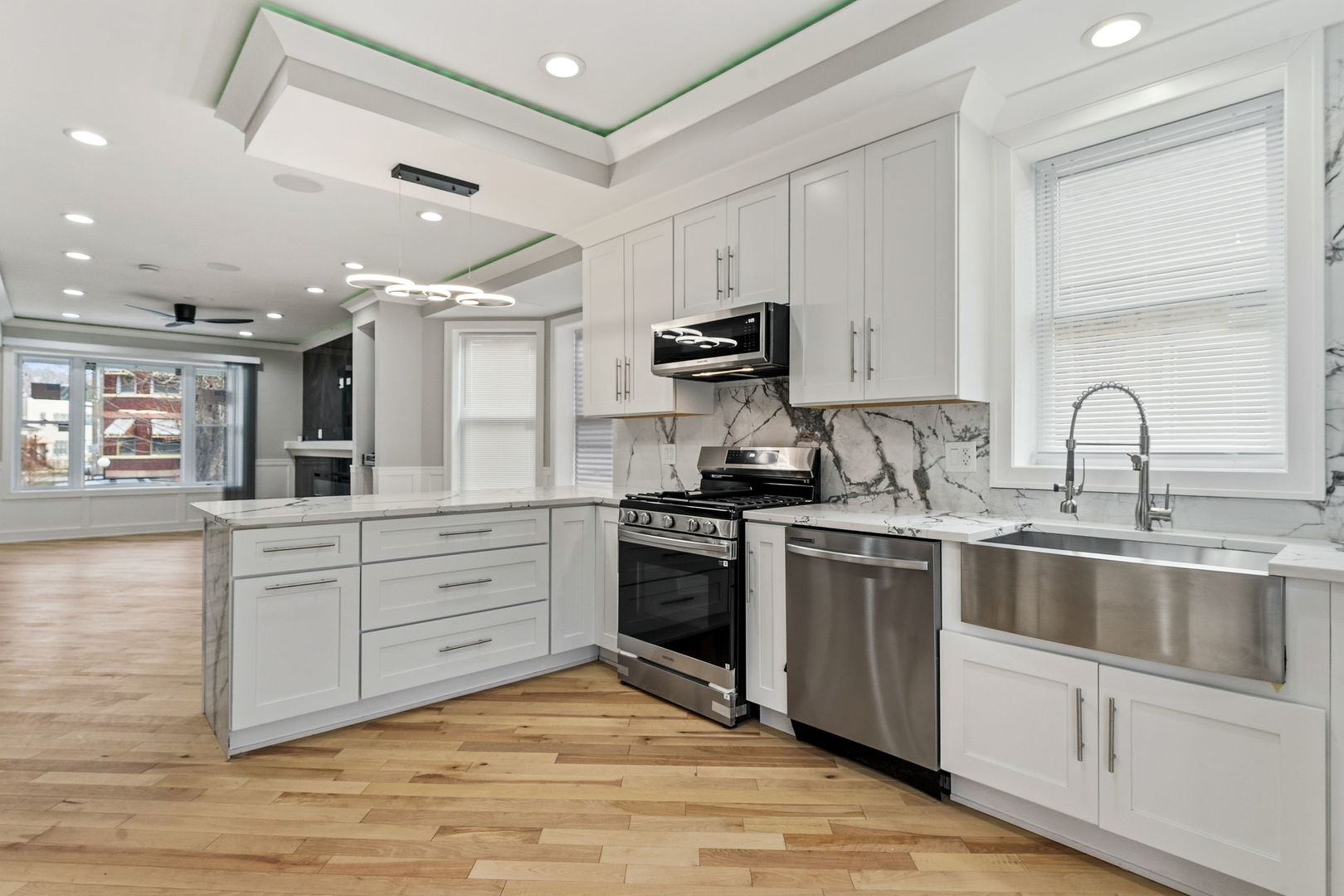 9410 South Champlain Avenue Chicago, IL 60619 - Photo 10 of 35 a kitchen with a sink cabinets and appliances