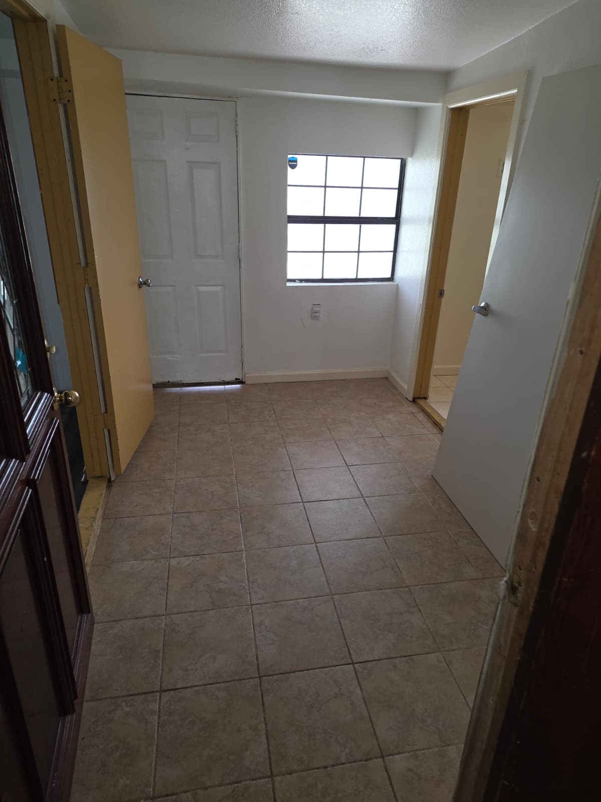 8214 Barkley Street Houston, TX 77017 - Photo 9 of 9 Back door entry with tile flooring.