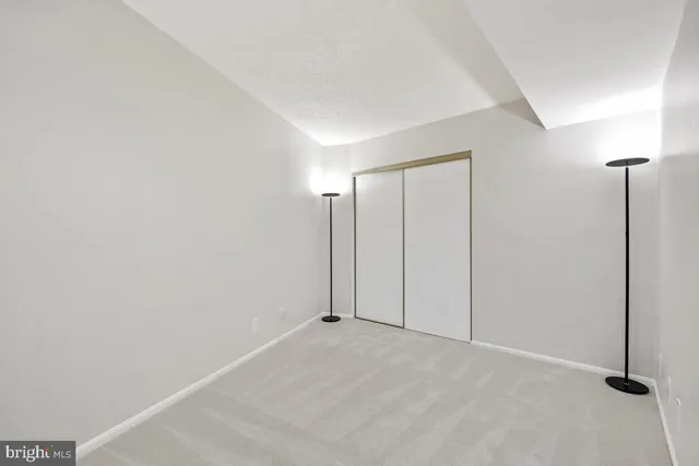 a view of a closet with storage