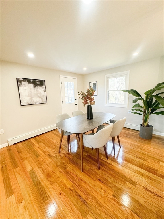 12 Evelyn Road Beverly, MA 01915 - Photo 15 of 37 a view of a dining room with furniture and wooden floor
