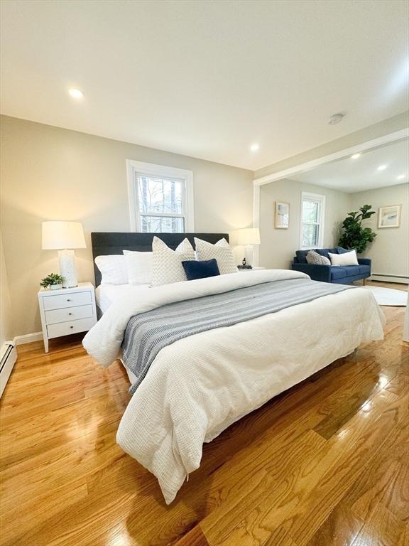 12 Evelyn Road Beverly, MA 01915 - Photo 17 of 37 a bedroom with a bed and a night stand