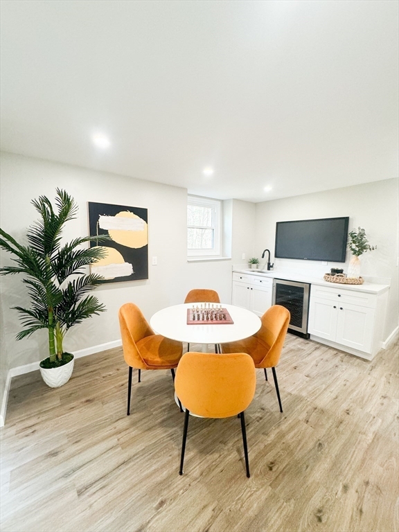 12 Evelyn Road Beverly, MA 01915 - Photo 24 of 37 a living room with furniture and a potted plant
