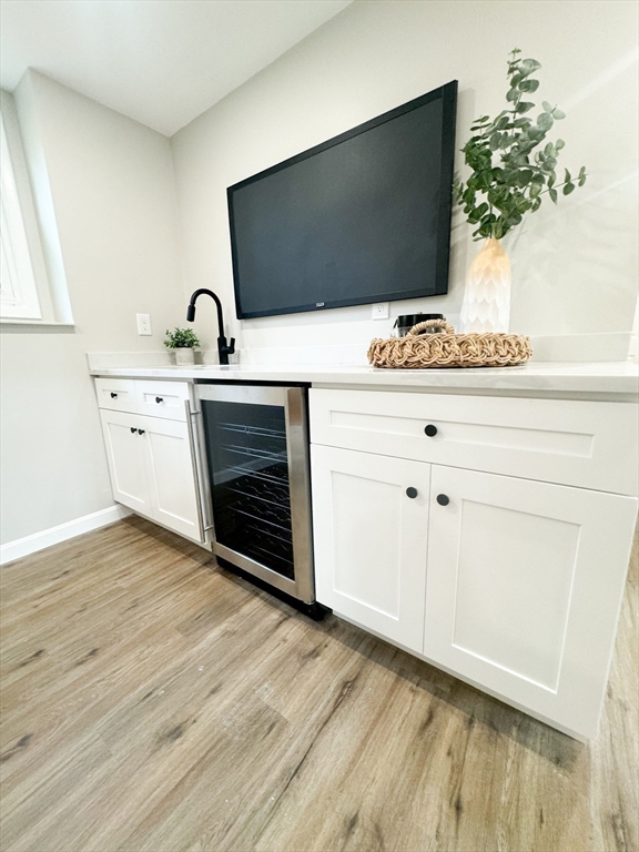 12 Evelyn Road Beverly, MA 01915 - Photo 25 of 37 a living room with furniture and flat screen tv