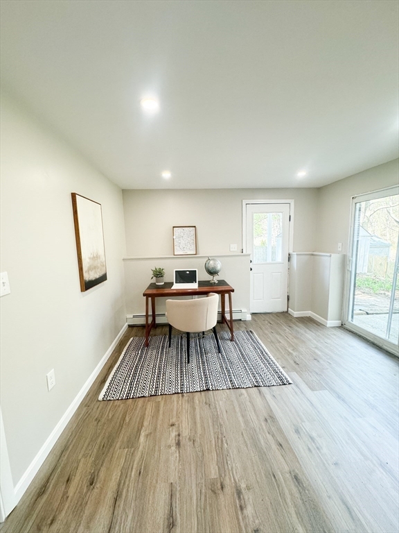 12 Evelyn Road Beverly, MA 01915 - Photo 27 of 37 a living room with a bed furniture and a window