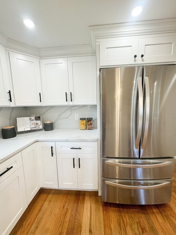 12 Evelyn Road Beverly, MA 01915 - Photo 10 of 37 a kitchen with appliances and cabinets