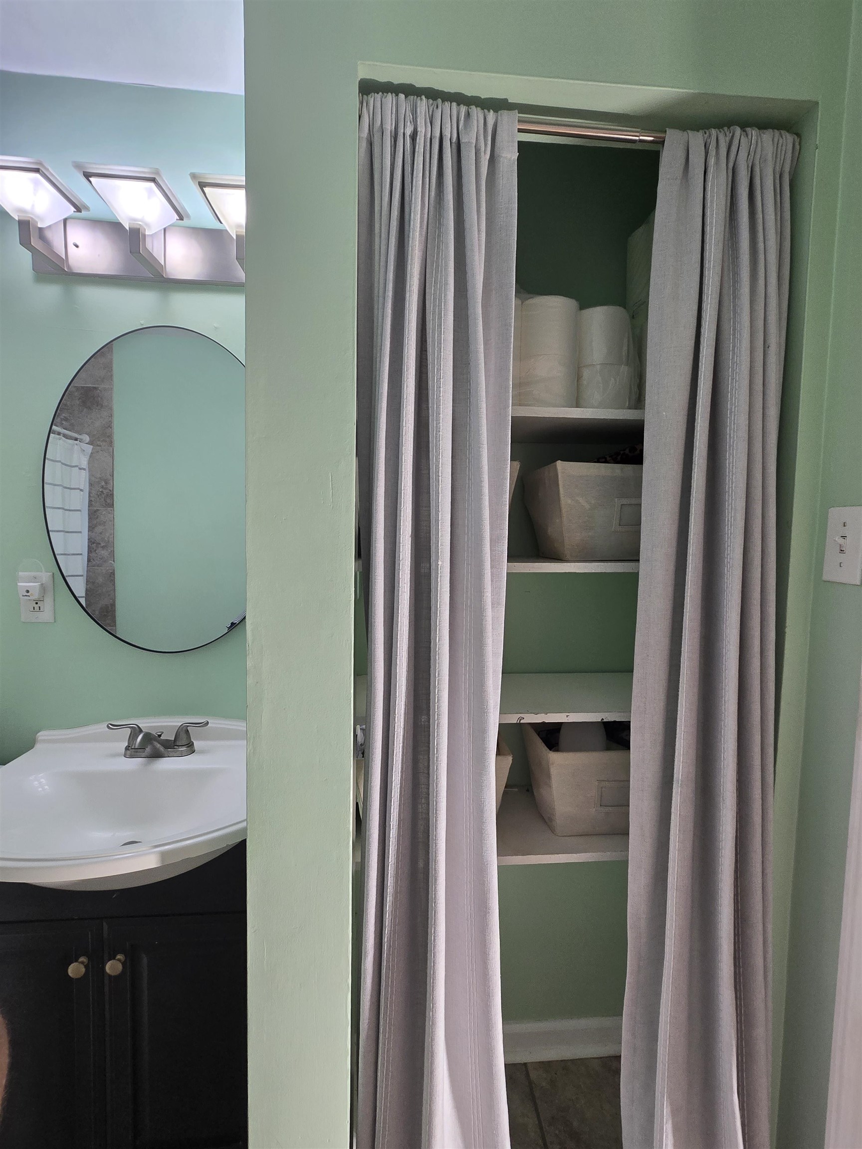 5475 Mesquite Road Memphis, TN 38120 - Photo 11 of 23 a bathroom with a sink and a mirror