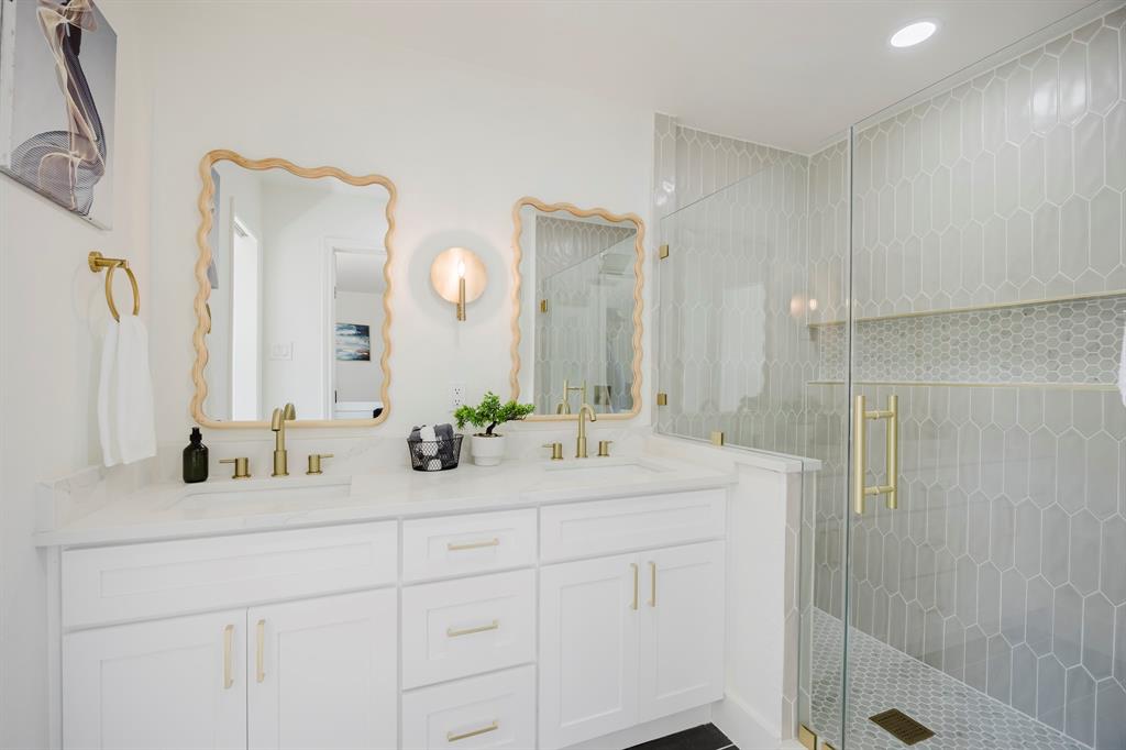 2120 Fairfax Road Denton, TX 76205 - Photo 14 of 23 a bathroom with a double vanity sink and mirror