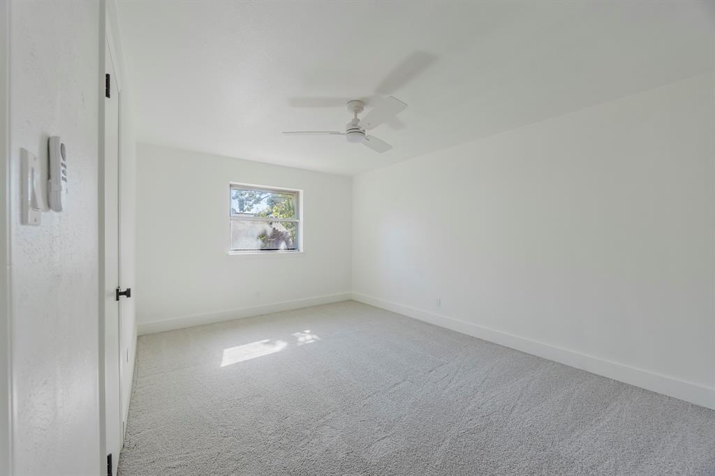2120 Fairfax Road Denton, TX 76205 - Photo 16 of 23 an empty room with windows