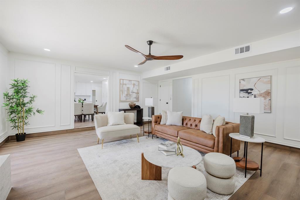 2120 Fairfax Road Denton, TX 76205 - Photo 6 of 23 a living room with furniture and a potted plant