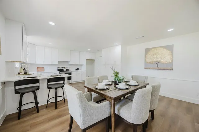 a view of a dining room with furniture