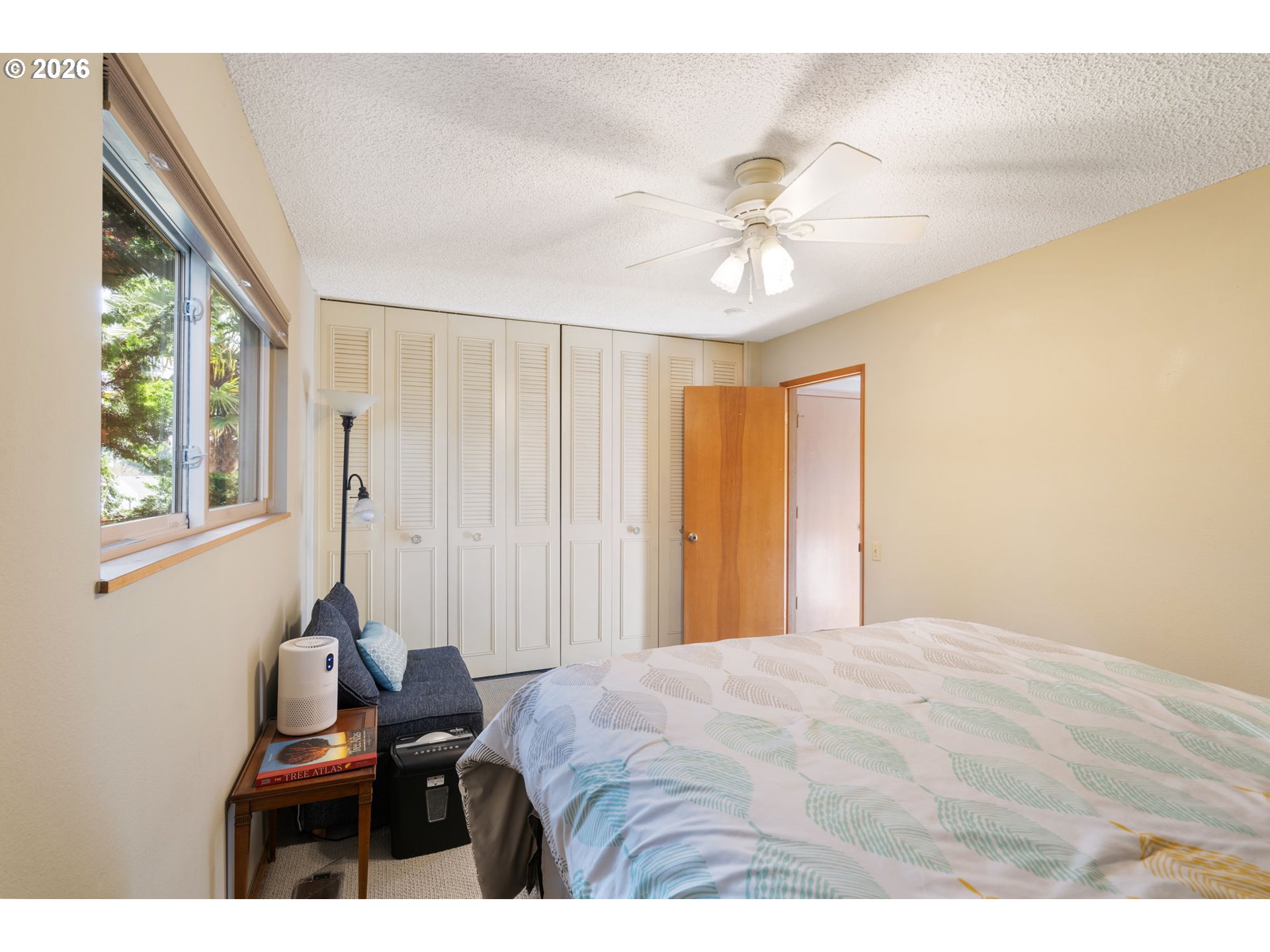 12441 Southwest King George Drive Portland, OR 97224 - Photo 15 of 36 a bedroom with a bed and a window