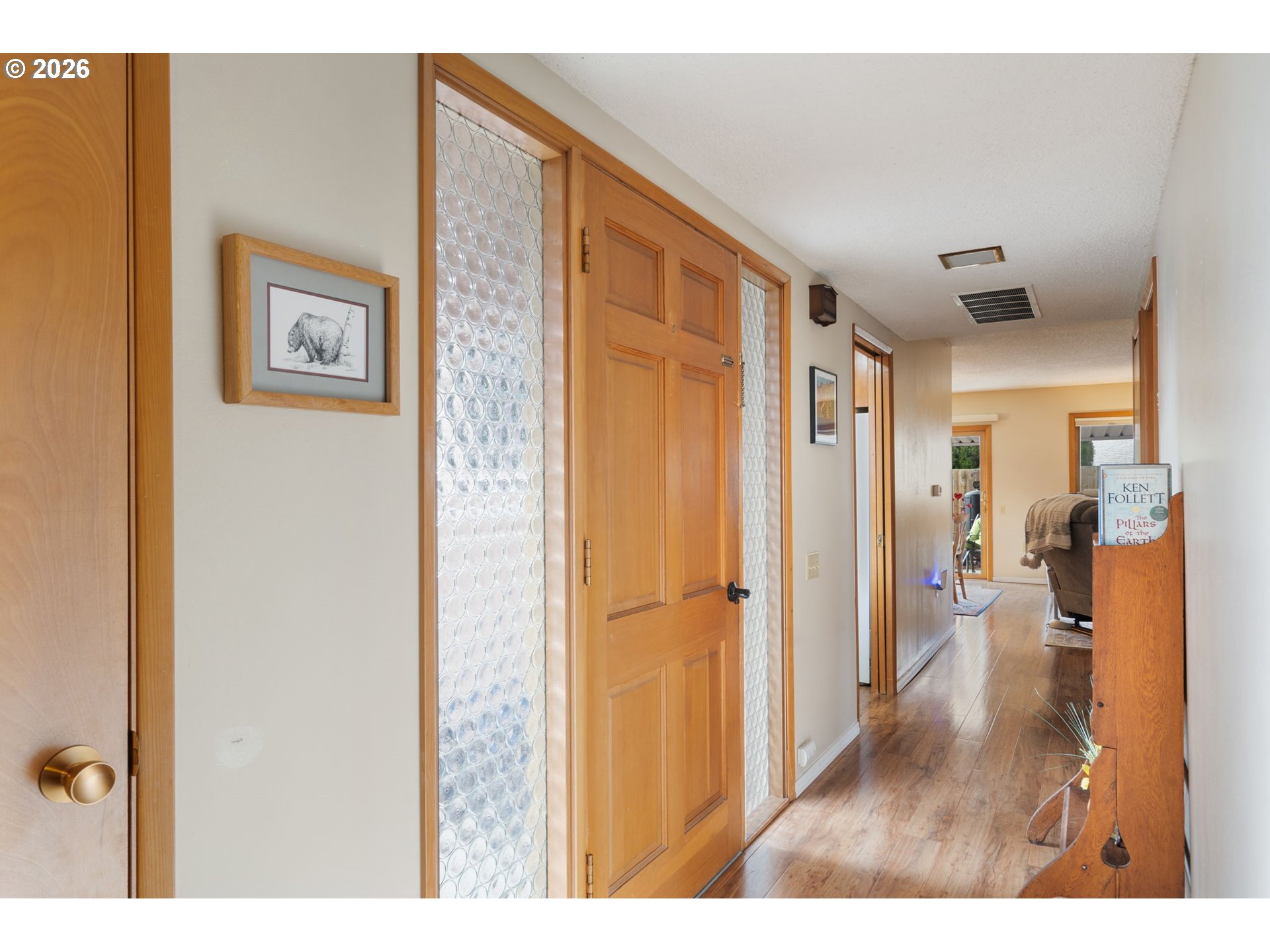 12441 Southwest King George Drive Portland, OR 97224 - Photo 17 of 36 a view of a hallway with bathroom and front door