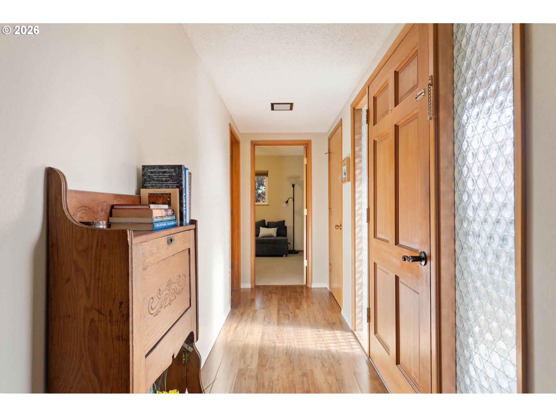 12441 Southwest King George Drive Portland, OR 97224 - Photo 18 of 36 a hallway with wooden floor and furniture