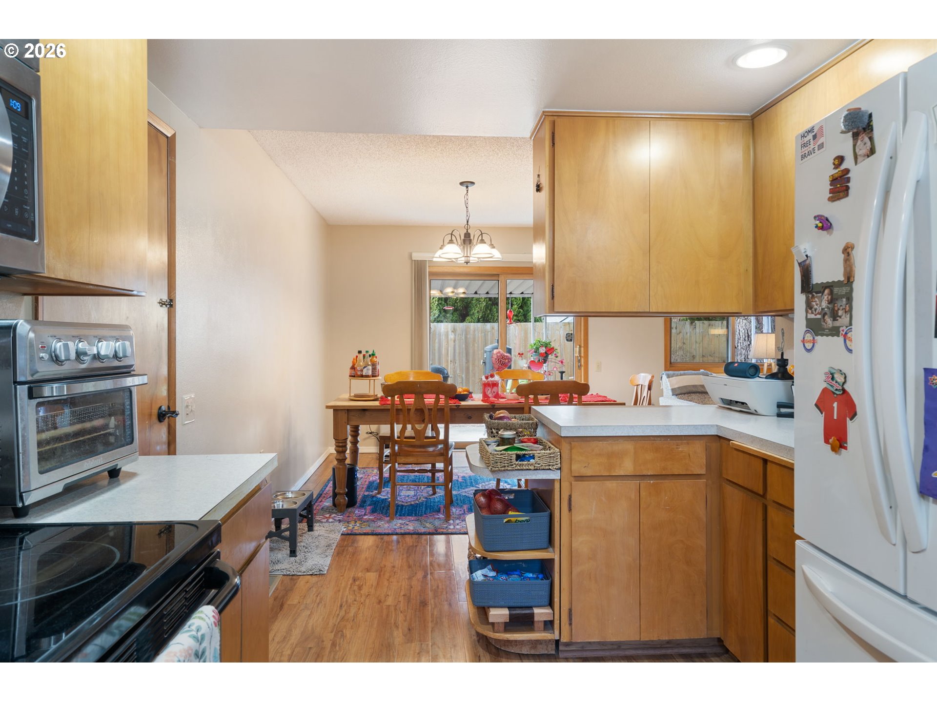 12441 Southwest King George Drive Portland, OR 97224 - Photo 26 of 36 a view of a kitchen and dining room