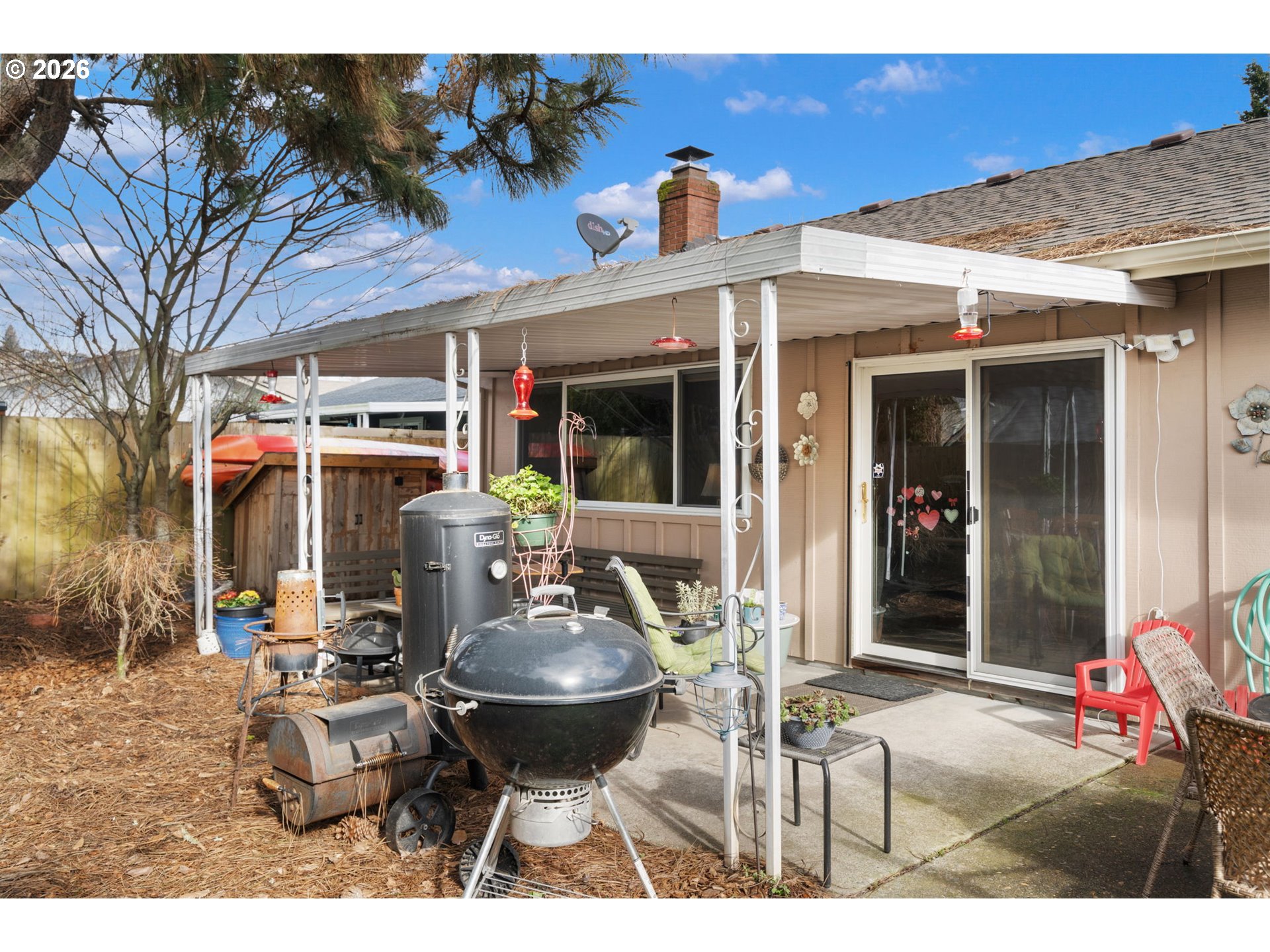 12441 Southwest King George Drive Portland, OR 97224 - Photo 33 of 36 a view of a patio with table and chairs