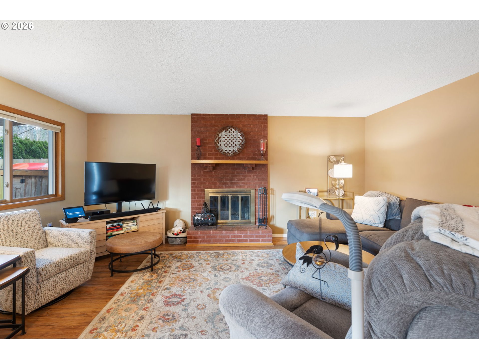 12441 Southwest King George Drive Portland, OR 97224 - Photo 7 of 36 a living room with furniture and a flat screen tv