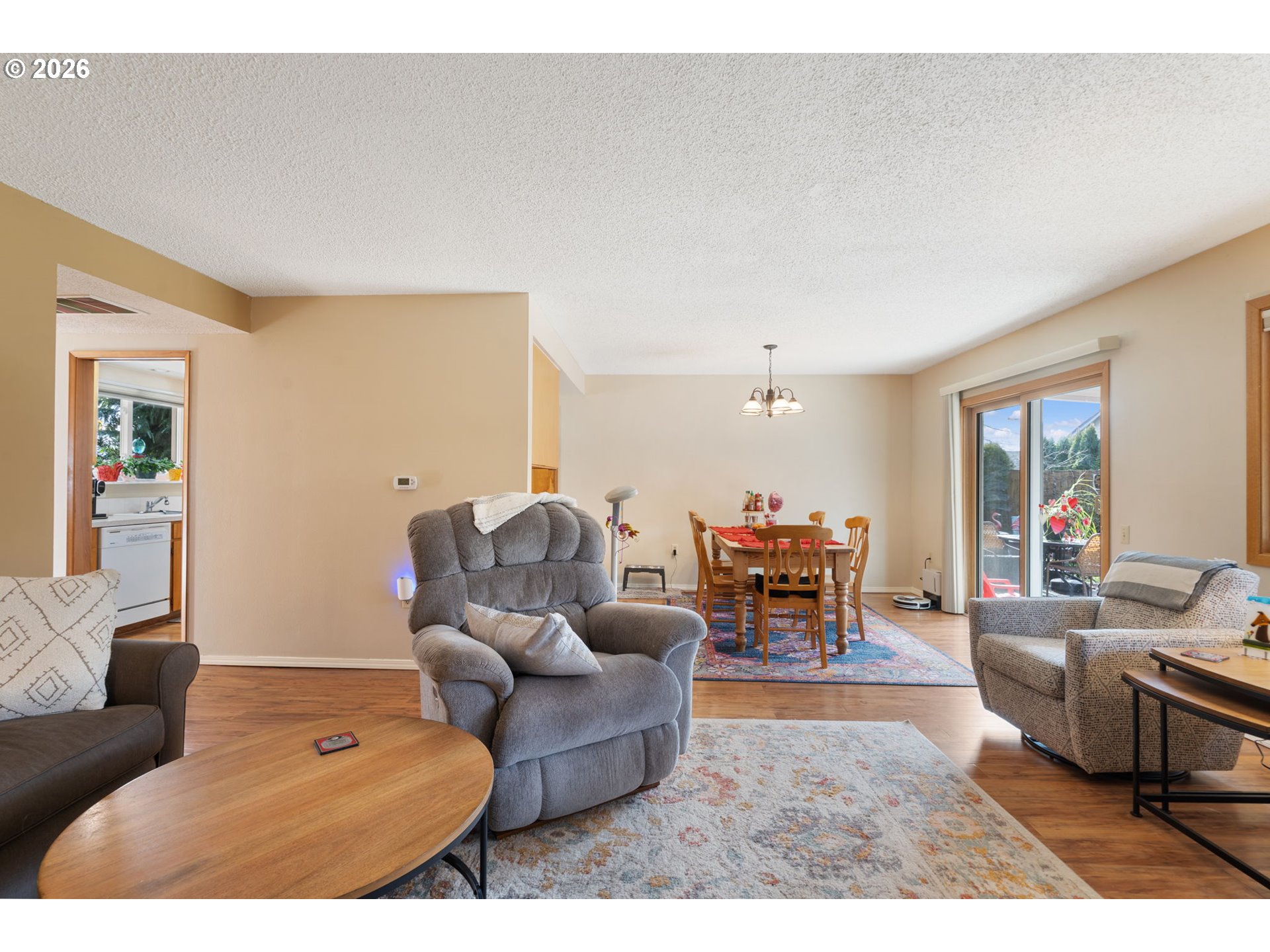 12441 Southwest King George Drive Portland, OR 97224 - Photo 9 of 36 a living room with furniture and a large window