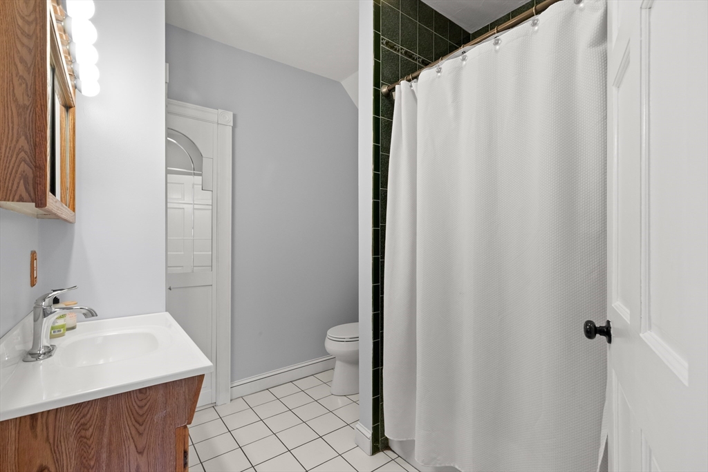 3 Smith Avenue Methuen, MA 01844 - Photo 19 of 38 a bathroom with a sink and a mirror