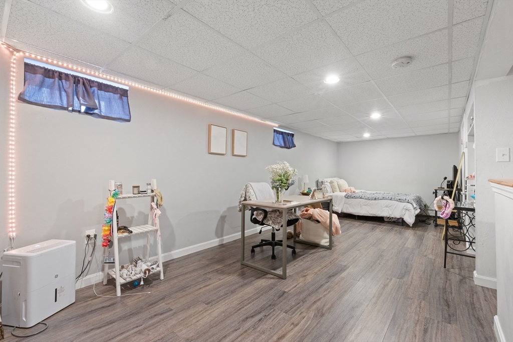 3 Smith Avenue Methuen, MA 01844 - Photo 29 of 38 a living room with furniture and a wooden floor