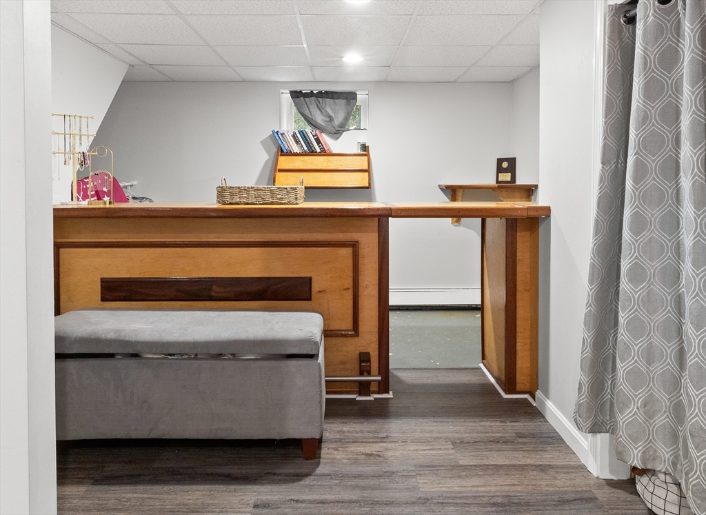 3 Smith Avenue Methuen, MA 01844 - Photo 32 of 38 a living room with furniture and a flat screen tv
