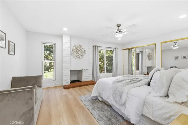a bathroom with double vanity sinks and a mirror