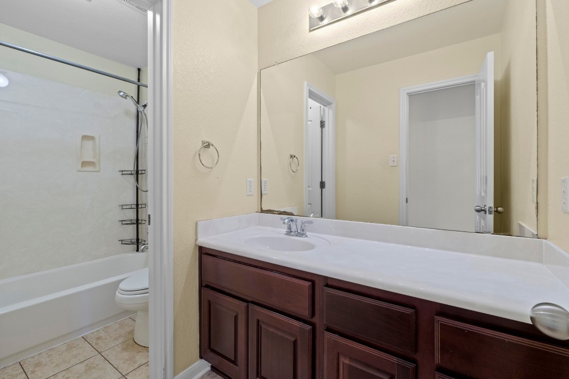 3228 Ranch Park Trail Round Rock, TX 78681 - Photo 34 of 40 Secondary bath upstairs with 2 separate areas so two people can use this bathroom at the same time.