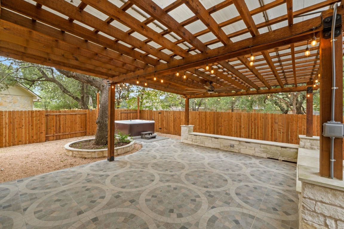 3228 Ranch Park Trail Round Rock, TX 78681 - Photo 39 of 40 Fenced backyard with a patio area, a hot tub, and a covered roofpergola