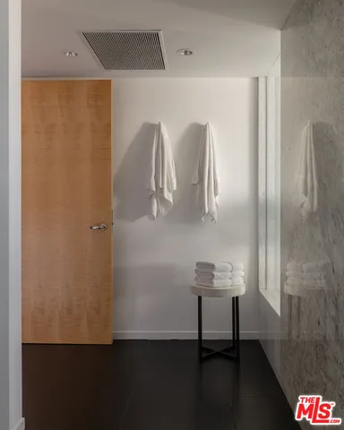 a room with a table and chairs