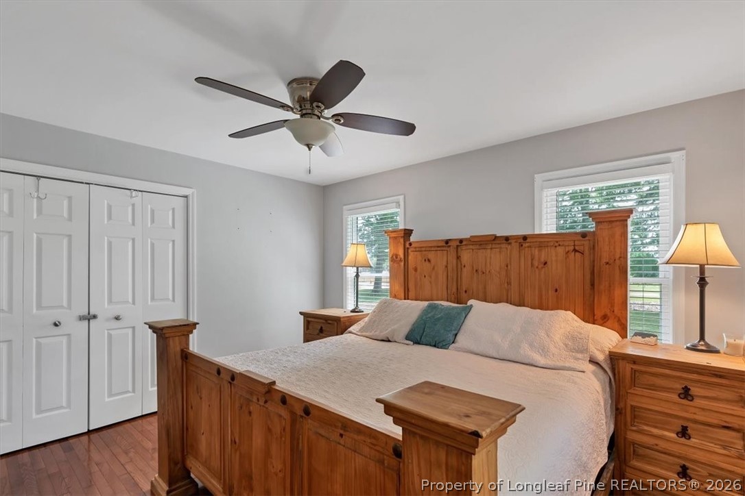 7266 Pleasant Hope Road Fairmont, NC 28340 - Photo 26 of 45 a bedroom with a bed and a night stand