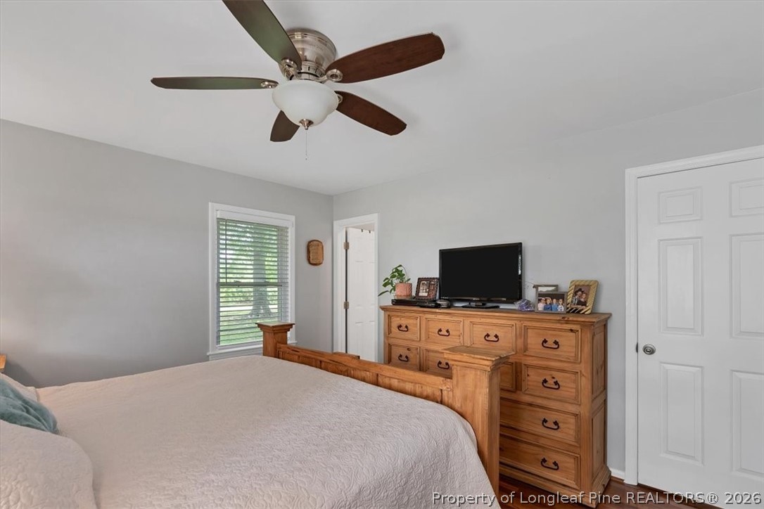 7266 Pleasant Hope Road Fairmont, NC 28340 - Photo 27 of 45 a bedroom with a bed and a television