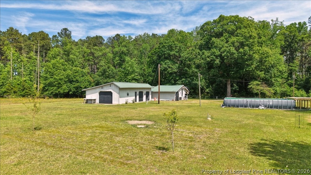 7266 Pleasant Hope Road Fairmont, NC 28340 - Photo 39 of 45 a front view of a house with a yard