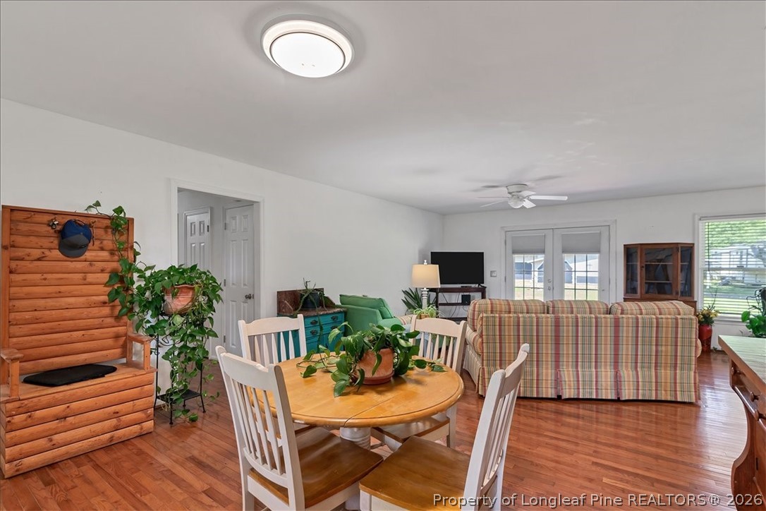 7266 Pleasant Hope Road Fairmont, NC 28340 - Photo 6 of 45 a living room with furniture dining table and a potted plant