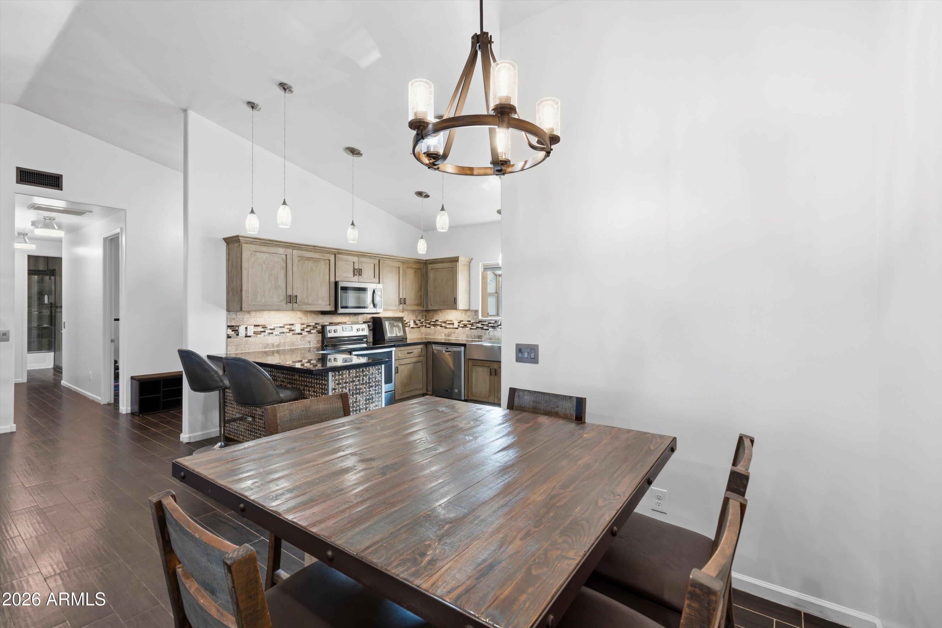 9023 South Dean Road Buckeye, AZ 85326 - Photo 7 of 32 11-Dining to Kitchen