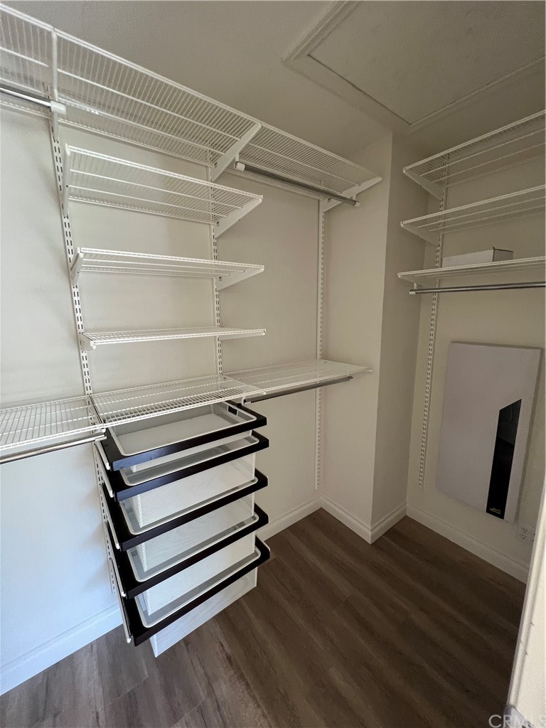 80 Hedge Bloom Irvine, CA 92618 - Photo 8 of 12 a view of a room with wooden floor and white walls