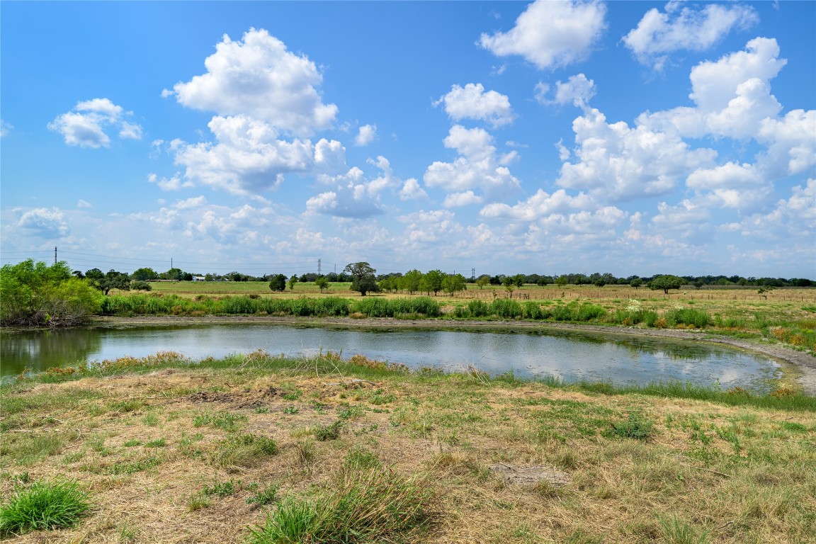 2171 Highway 237 Round Top, TX 78954 - Photo 6 of 14 a view of a lake with houses in the back