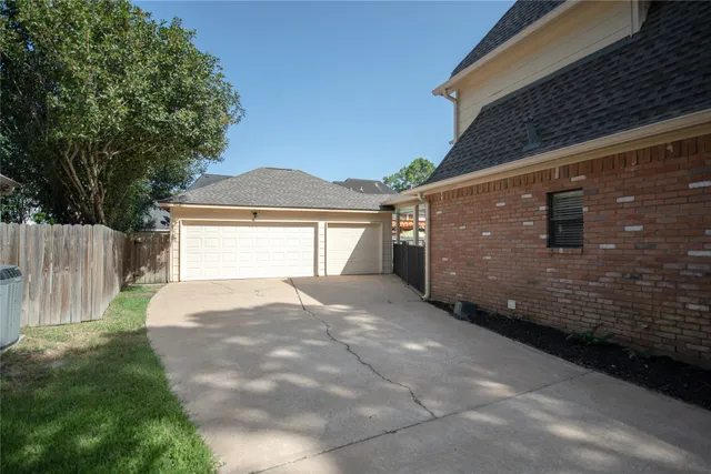 a view of a swimming pool and dinning table and chairs