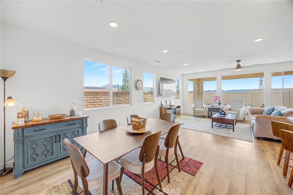 1685 Spring Run Lane Beaumont, CA 92223 - Photo 17 of 57 a living room with furniture and a large window