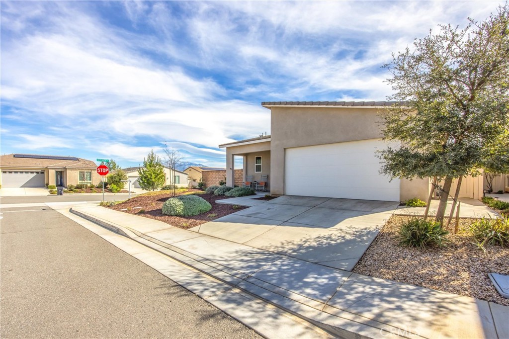 1685 Spring Run Lane Beaumont, CA 92223 - Photo 3 of 57 Beautiful property in every way! 2.8 kw Sun Power solar panel array installed by builder. (assumable by home buyer at $75 per month.)
