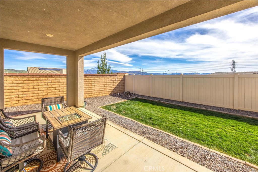 1685 Spring Run Lane Beaumont, CA 92223 - Photo 33 of 57 Backyard patio with big sky views